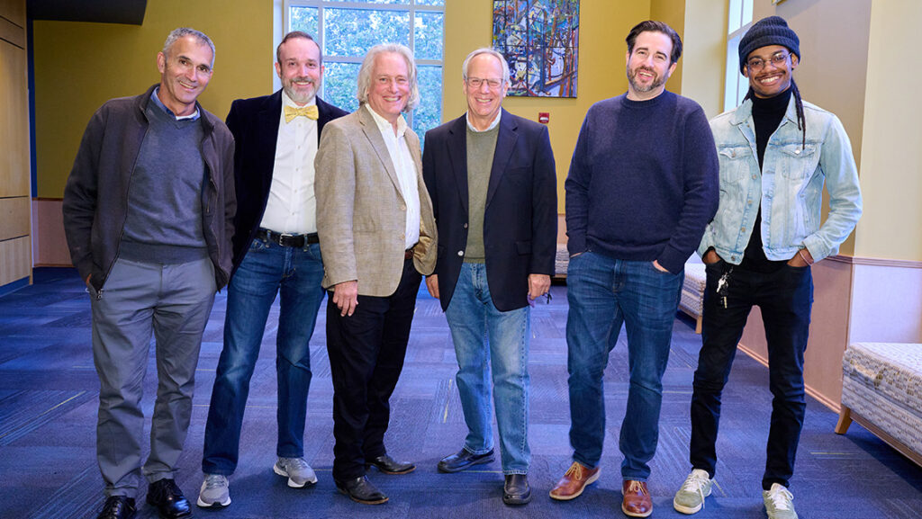 Dr. Frierson stands with the production team of the film, "Fred Chappell: I Am One of You Forever"