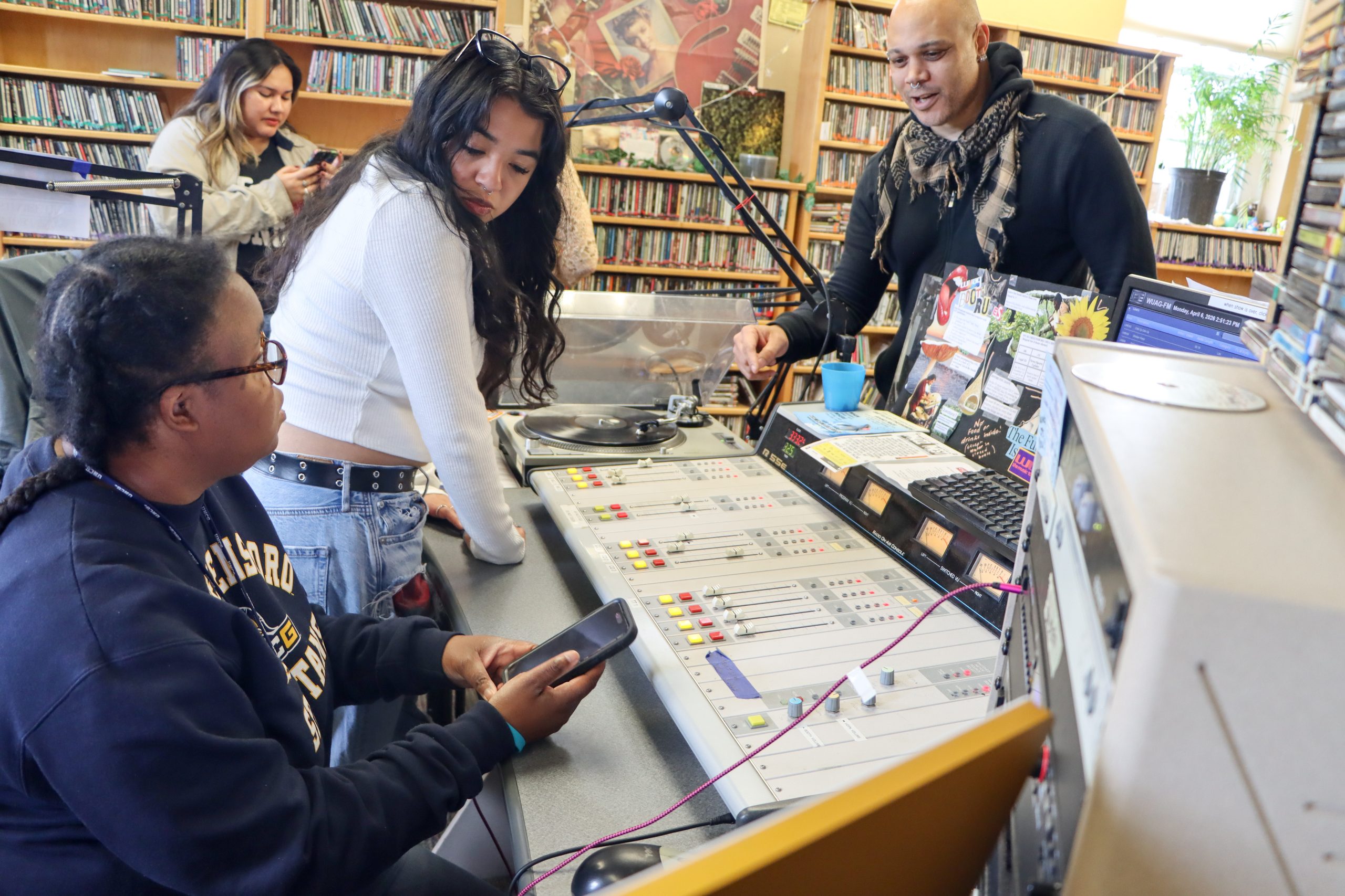 Media Studies senior lecturer Hassan Pitts in the studio with students